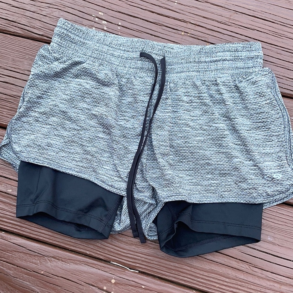 Athletic shorts with sewn in spandex